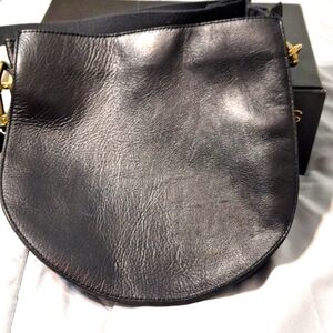 Madewell black crossbody bag Cresent shape.